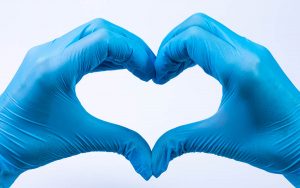 Doctor's hands making heart shape. COVID-19 - How Practices Are Adapting